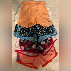 3 NWOT, 1 EUC (peach/white reebok)